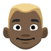 👱🏿 person: dark skin tone, blond hair display on Facebook